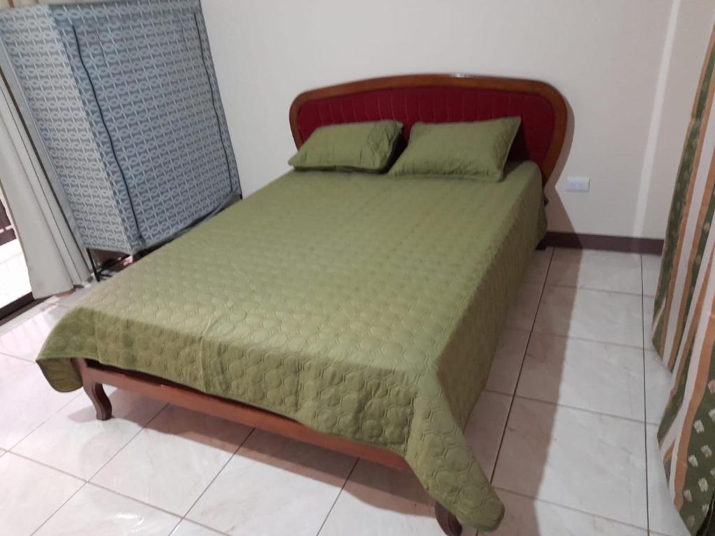Un pat sau paturi într-o cameră la Apartment, Santa Cruz, Buenos Aires, Costa Rica
