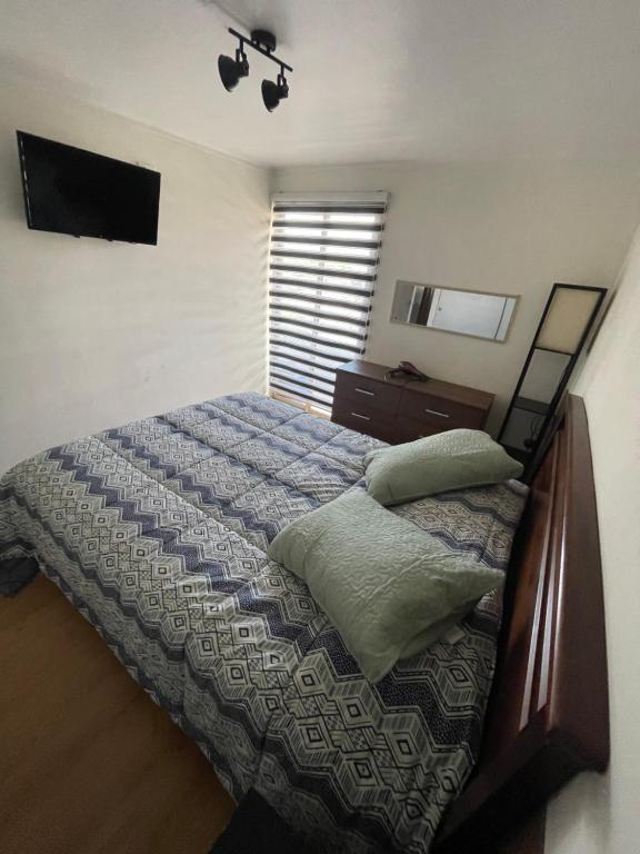 Posteľ alebo postele v izbe v ubytovaní Hermoso Depto Centrico