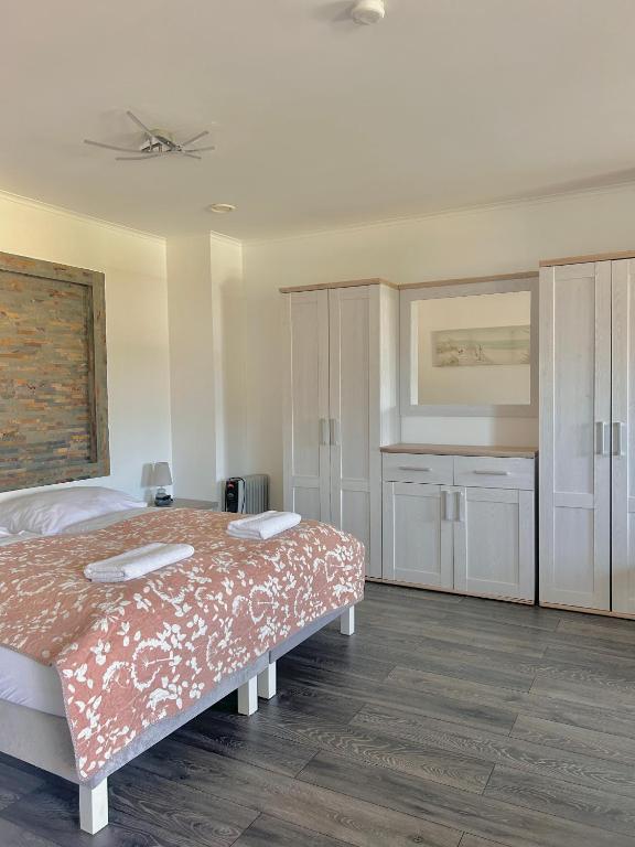 Postel nebo postele na pokoji v ubytování Apartamenty Nexo