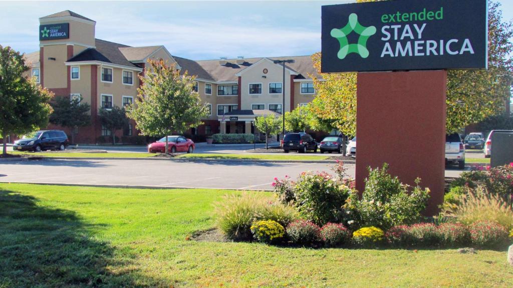 a sign for a stay america hotel in a parking lot at Extended Stay America Suites - Fishkill - Westage Center in Fishkill
