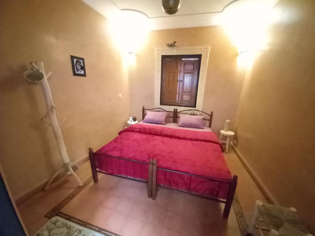 Postel nebo postele na pokoji v ubytování Riad Hostel JAD ZIAD
