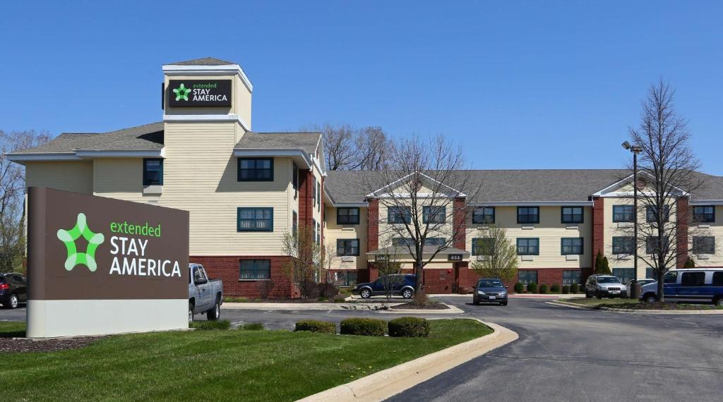 a building with a sign that says stay american at Extended Stay America Suites - Rockford - I-90 in Rockford