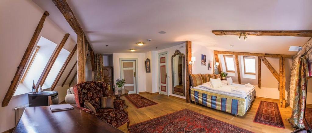 Postel nebo postele na pokoji v ubytování CRU Hotel