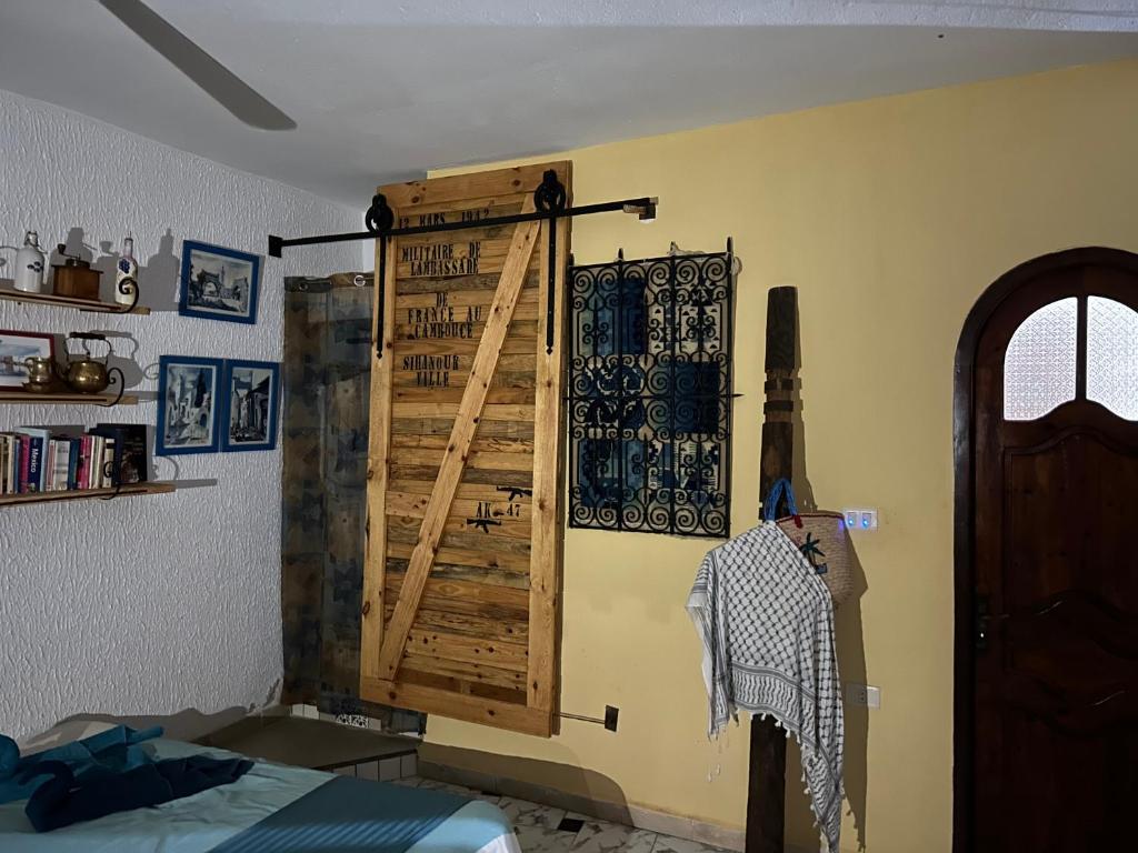 Postel nebo postele na pokoji v ubytování L'artisan