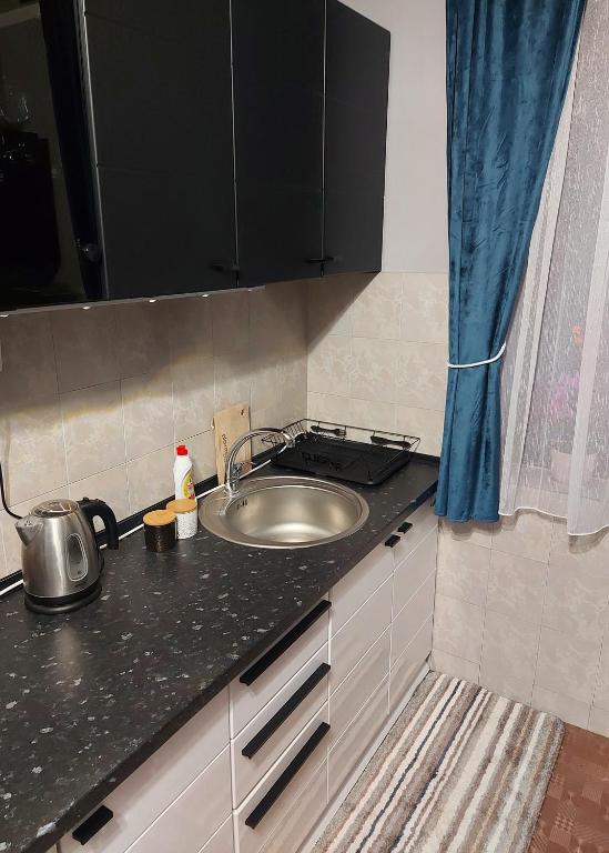 Eldhús eða eldhúskrókur á Quattro apartment