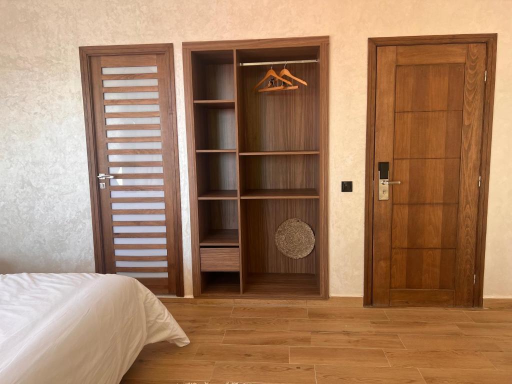 Postel nebo postele na pokoji v ubytování Beach Side Imsouane