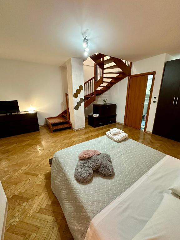 Postel nebo postele na pokoji v ubytování CASAVACANZETOFFEE