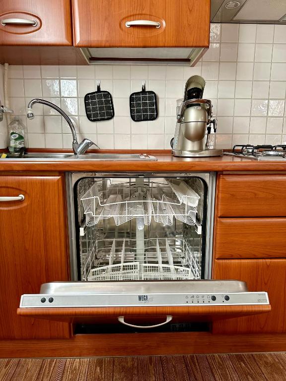 Kuchyň nebo kuchyňský kout v ubytování CASAVACANZETOFFEE