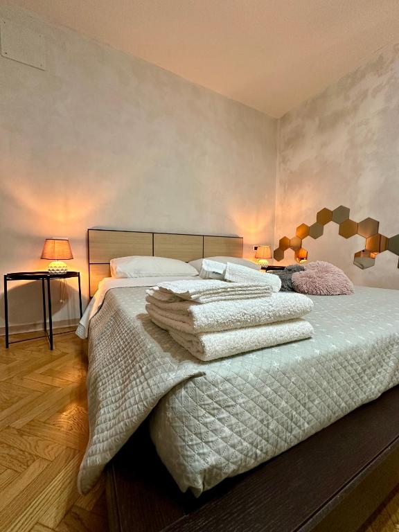 Postel nebo postele na pokoji v ubytování CASAVACANZETOFFEE