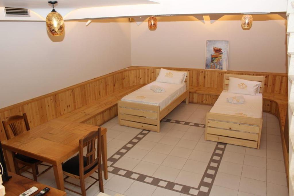 Postel nebo postele na pokoji v ubytování Villa Pasha Tirana