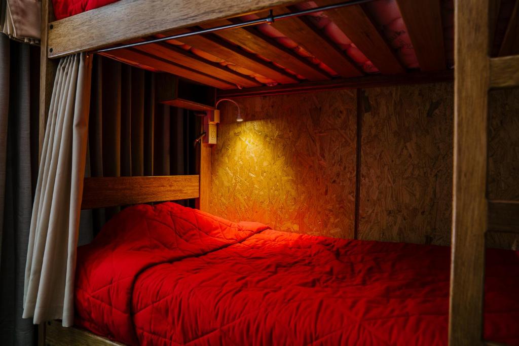 Voodi või voodid majutusasutuse Magar Hostel Bar toas