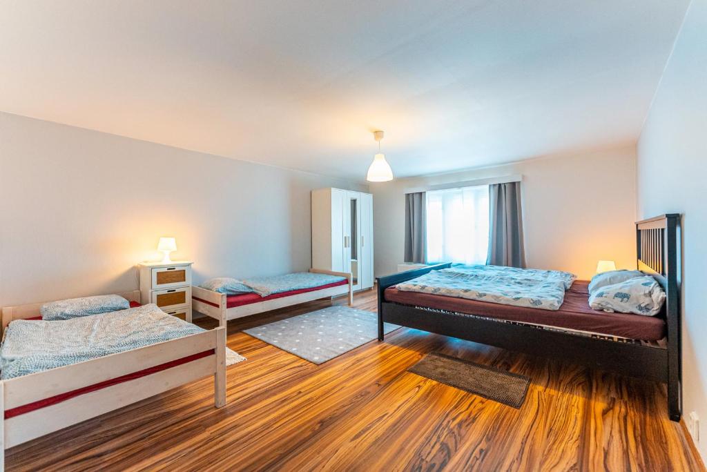 Apartmán Lobeč - pokoj číslo 1 tesisinde bir odada yatak veya yataklar
