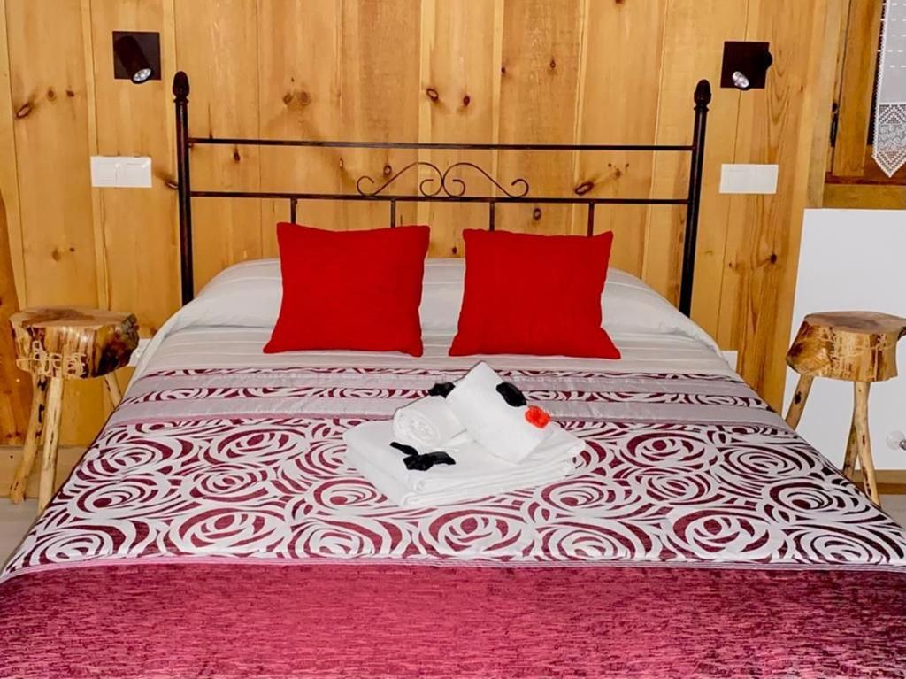 Posteľ alebo postele v izbe v ubytovaní El Busque Casa Rural