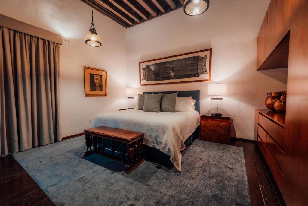 Postel nebo postele na pokoji v ubytování Antiguo Molino de San Jerónimo
