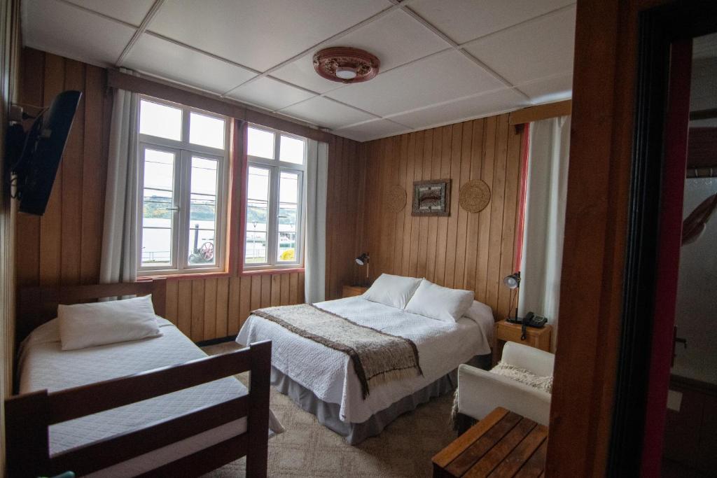 Postel nebo postele na pokoji v ubytování Hotel Unicornio Azul