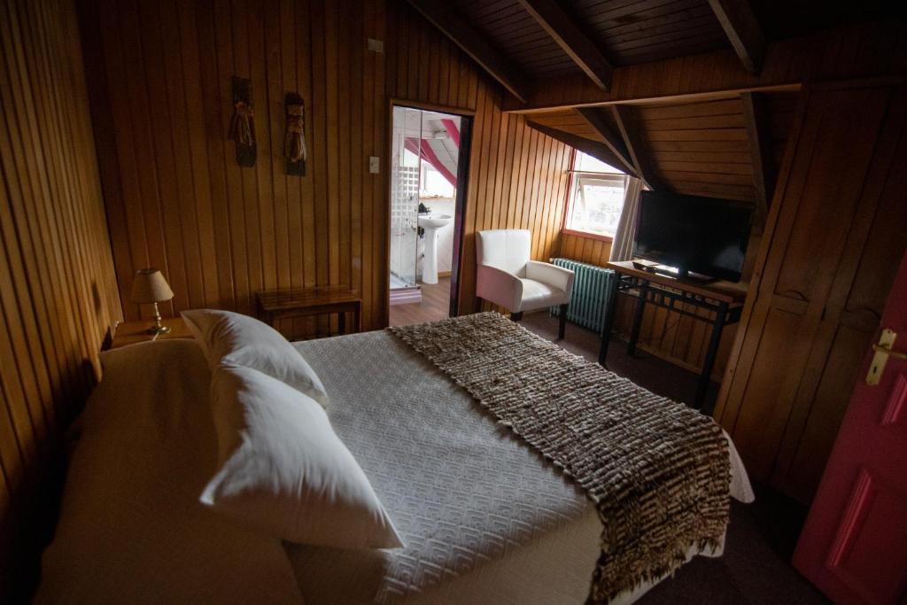 Postel nebo postele na pokoji v ubytování Hotel Unicornio Azul