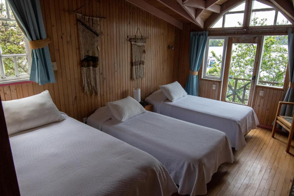 Postel nebo postele na pokoji v ubytování Hotel Unicornio Azul