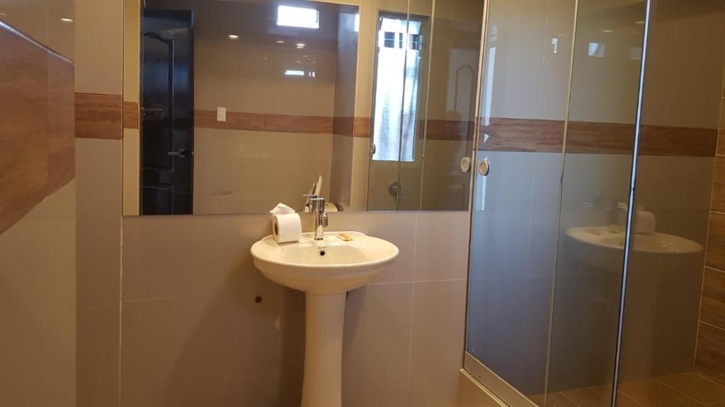 Koupelna v ubytování La Cabaña Hotel