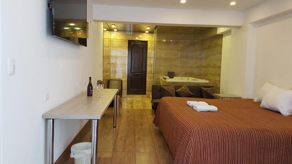 Postel nebo postele na pokoji v ubytování La Cabaña Hotel