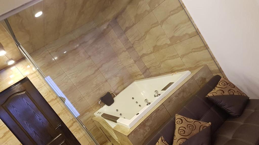 Koupelna v ubytování La Cabaña Hotel
