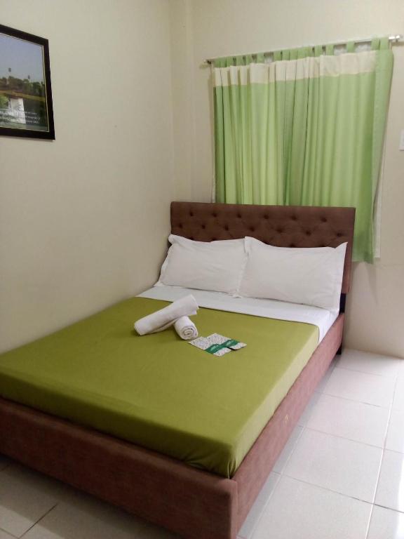 Postel nebo postele na pokoji v ubytování DMS Apartelle