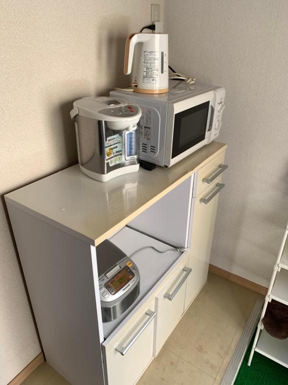 Kuchyň nebo kuchyňský kout v ubytování 风宿之所民宿
