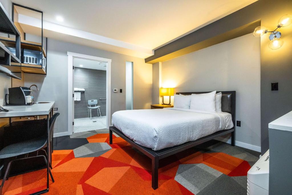 מיטה או מיטות בחדר ב-Infinity Hotel San Francisco, Tapestry Collection by Hilton