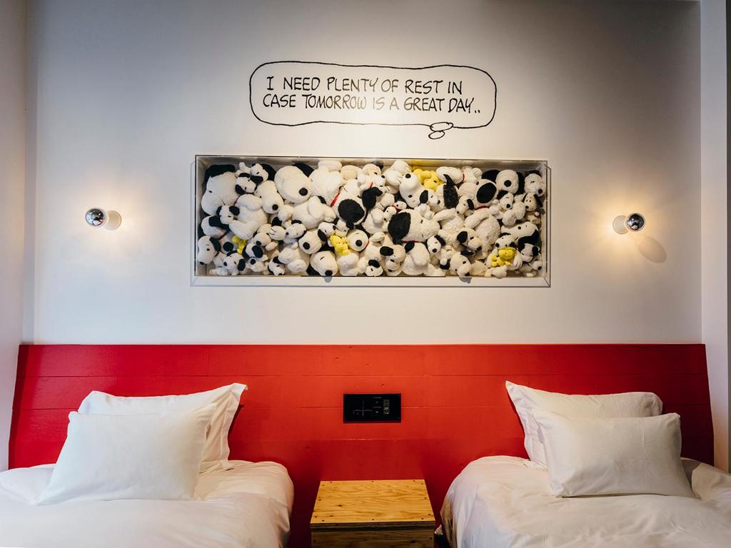 Postel nebo postele na pokoji v ubytování ピーナッツホテル/PEANUTS HOTEL
