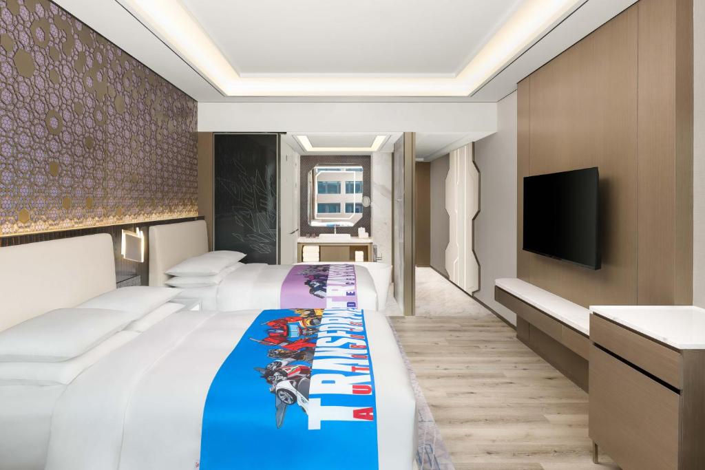 TV a/nebo společenská místnost v ubytování Shanghai Marriott Hotel Pudong South