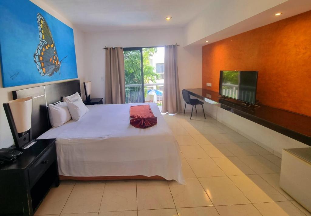 TV a/nebo společenská místnost v ubytování Hotel Holly