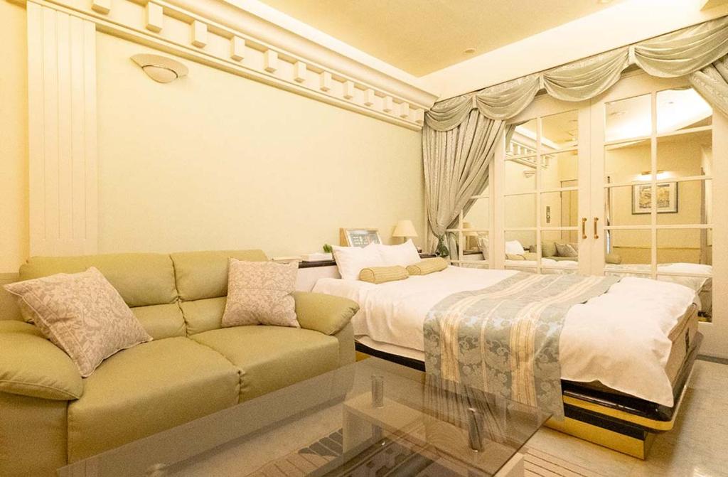 Postel nebo postele na pokoji v ubytování Hotel Dion ホテル ディオン - Adult Only