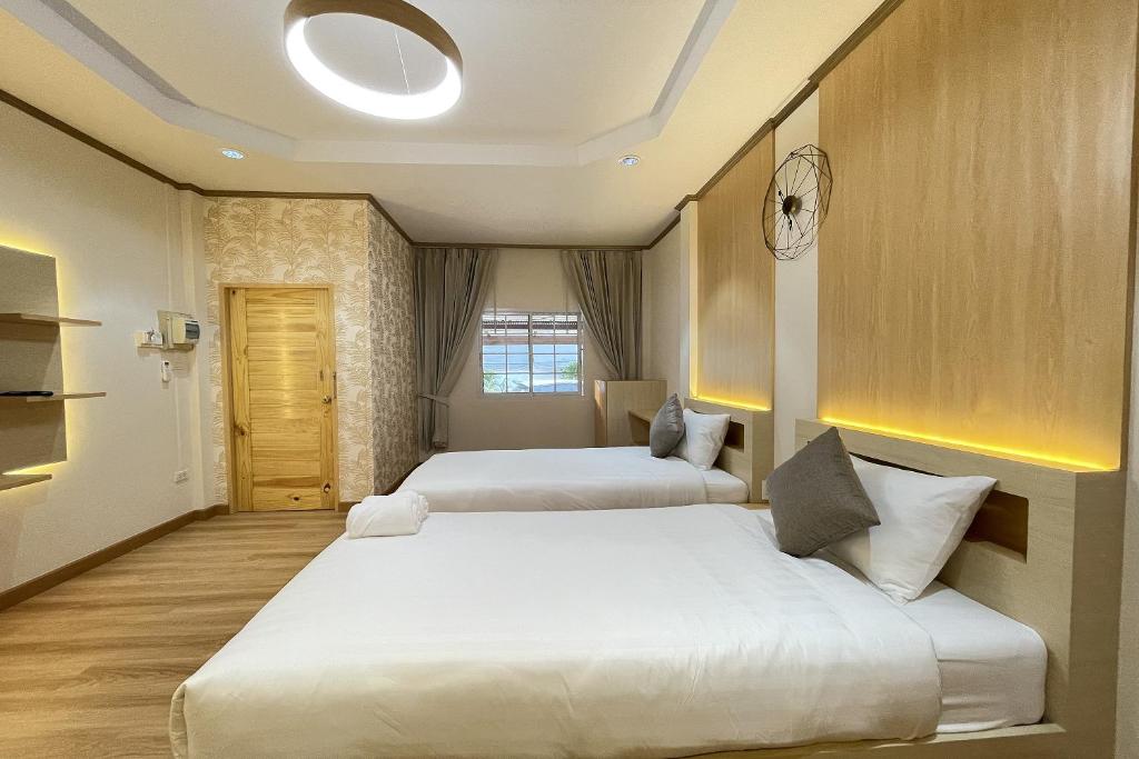 Postel nebo postele na pokoji v ubytování BB house & resort
