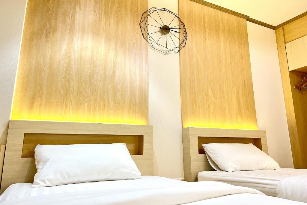 Postel nebo postele na pokoji v ubytování BB house & resort