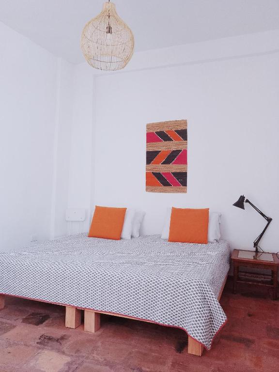Postel nebo postele na pokoji v ubytování Casita de Piedra