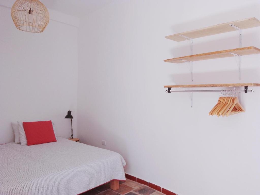 Postel nebo postele na pokoji v ubytování Casita de Piedra
