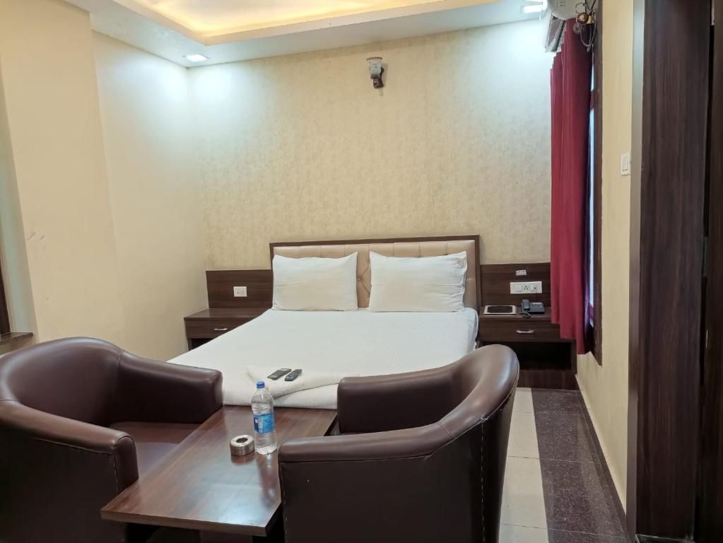 Кровать или кровати в номере The Metropol Hotel Siwan