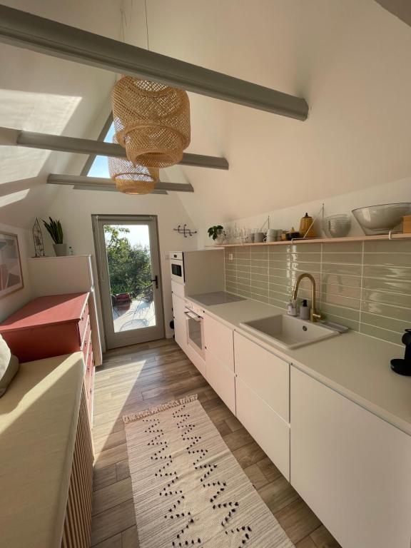Kuchyň nebo kuchyňský kout v ubytování Fotel home