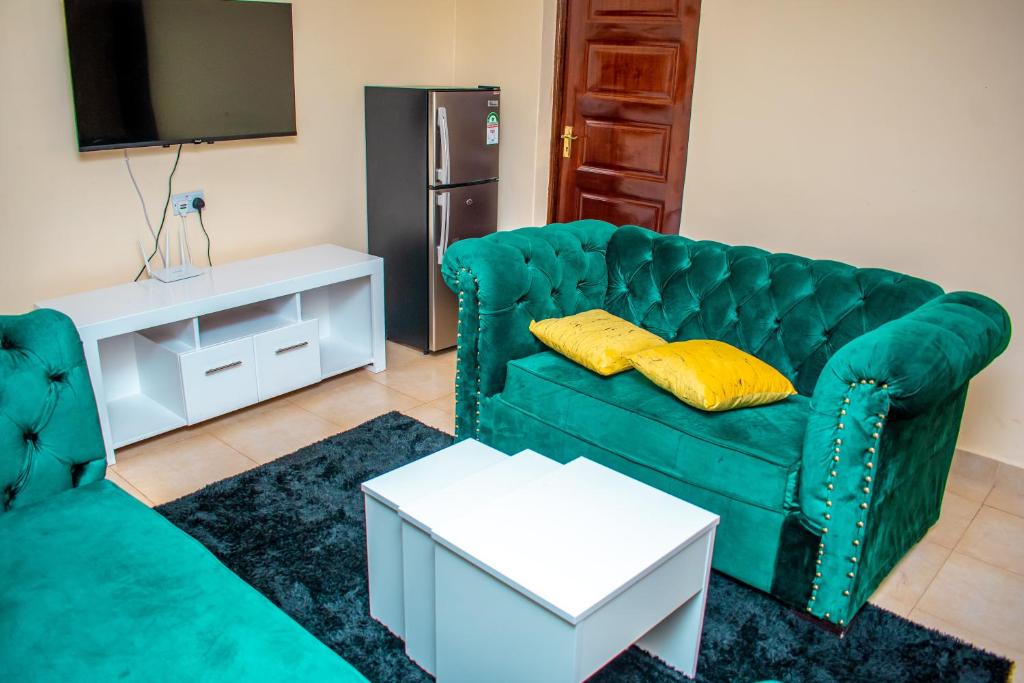 A seating area at Cozy apartment kisii