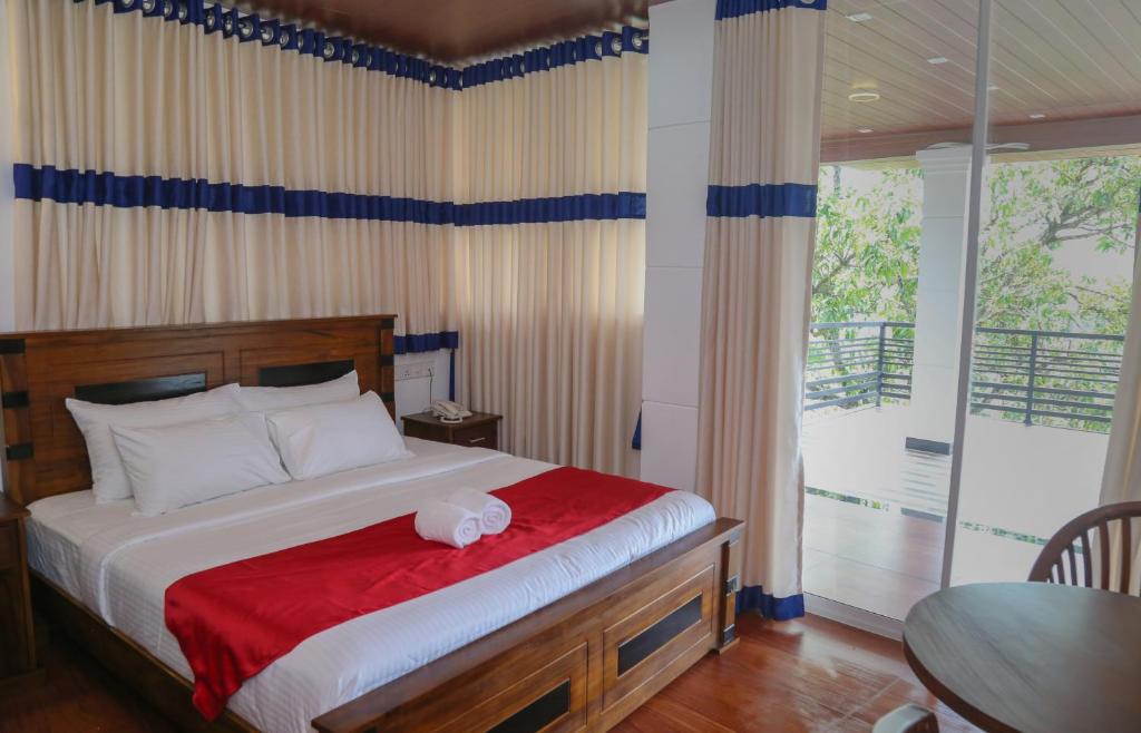 Postel nebo postele na pokoji v ubytování Hotel Sara