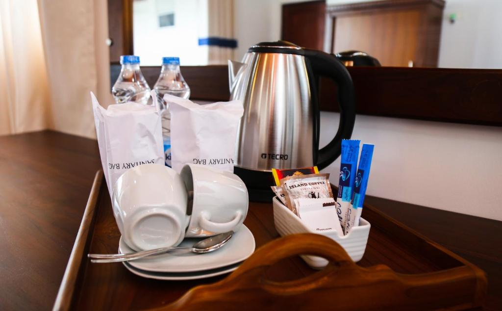 Příslušenství pro přípravu čaje a kávy v ubytování Hotel Sara
