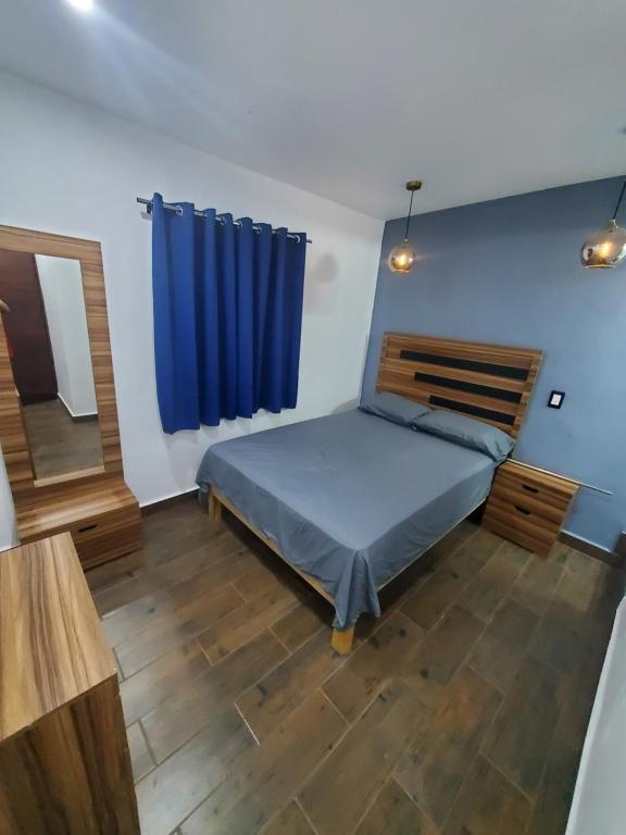 מיטה או מיטות בחדר ב-Casa josefa