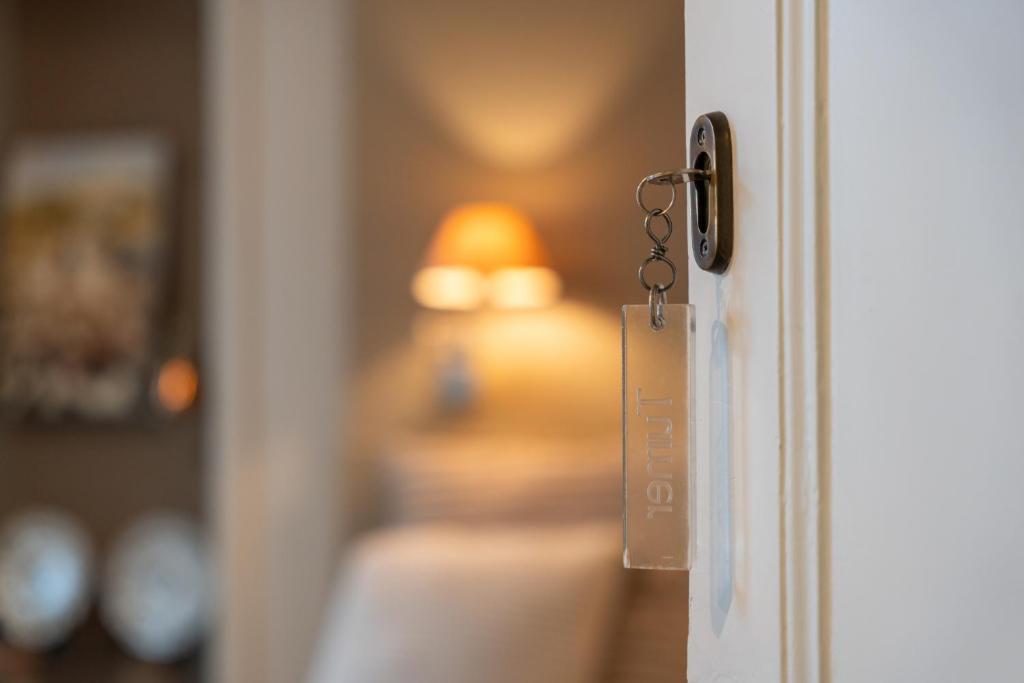 Postel nebo postele na pokoji v ubytování Het Geerwijn - gastensuite in hartje Brugge