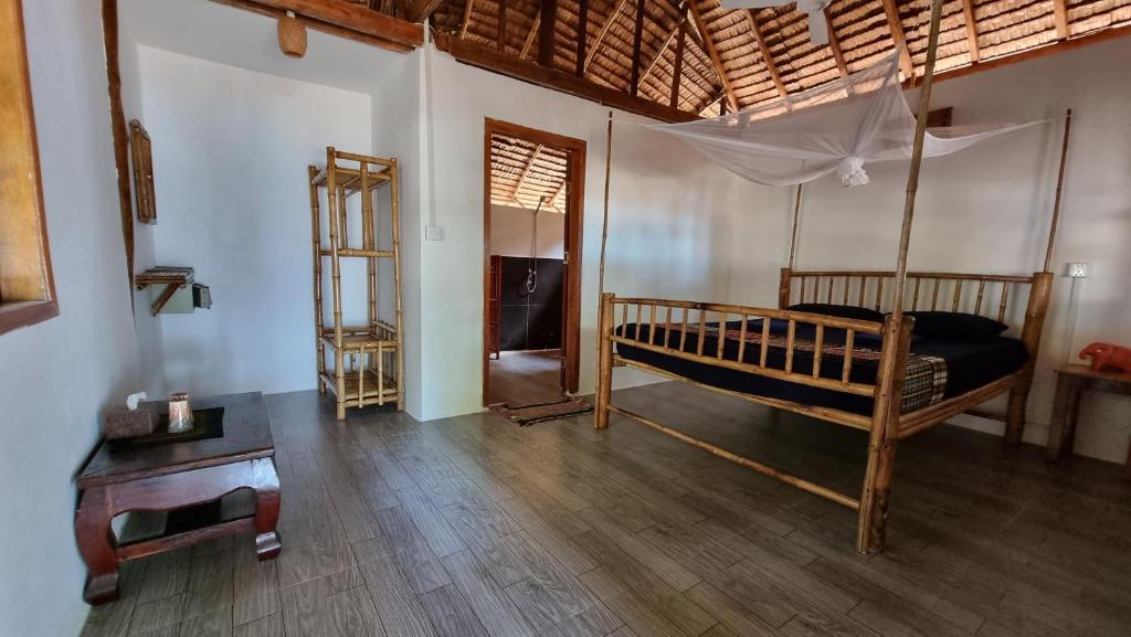 Postel nebo postele na pokoji v ubytování SunBoo Beach Bungalows