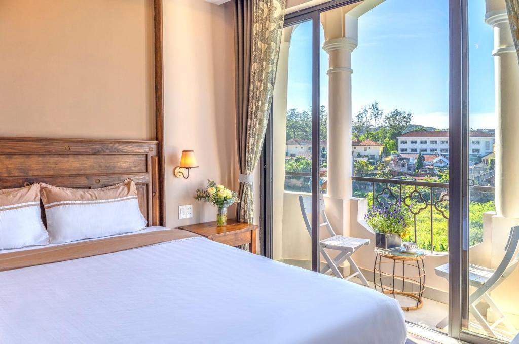 Postel nebo postele na pokoji v ubytování Guava Hill Boutique Hotel