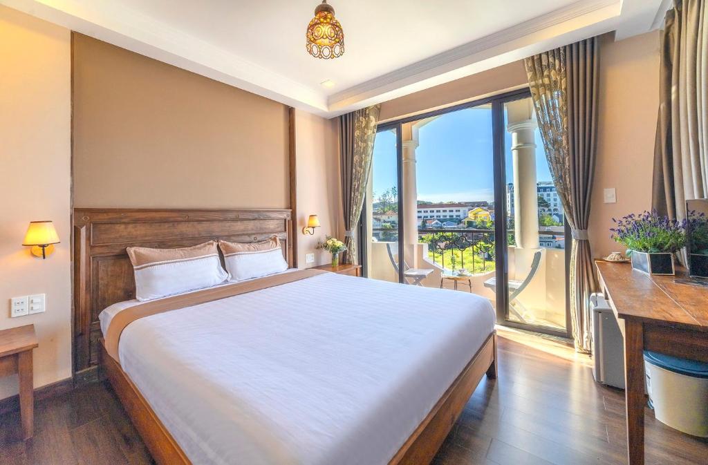Postel nebo postele na pokoji v ubytování Guava Hill Boutique Hotel