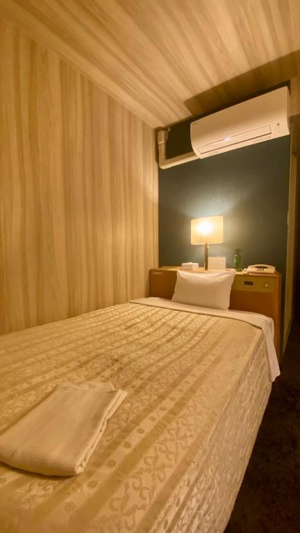 Postel nebo postele na pokoji v ubytování Hotel Select Inn Isehara