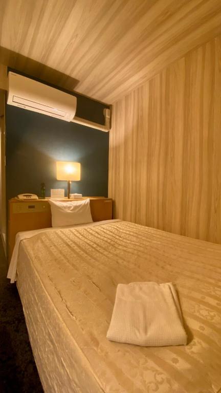 Postel nebo postele na pokoji v ubytování Hotel Select Inn Isehara