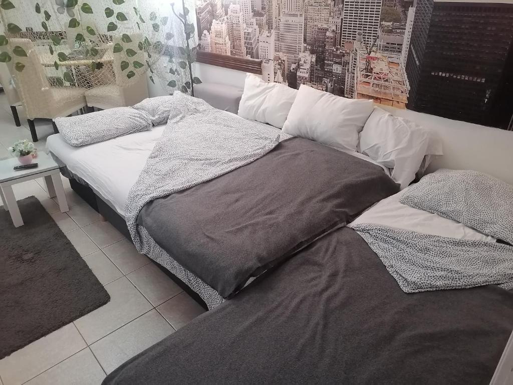 Postel nebo postele na pokoji v ubytování Low cost apartment