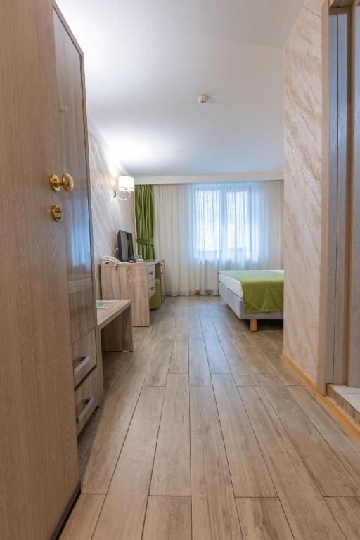 Postel nebo postele na pokoji v ubytování Hotel Corvaris