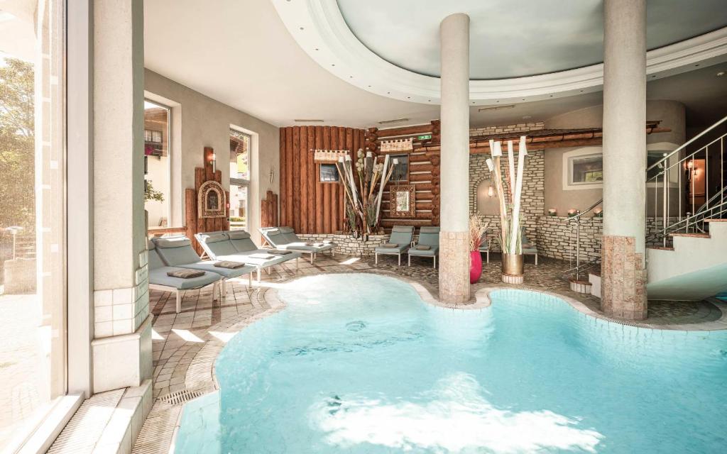 The swimming pool at or close to eva,VILLAGE